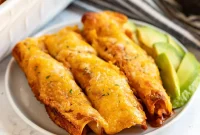 Cheesy Chicken Enchiladas with Creamy Sauce