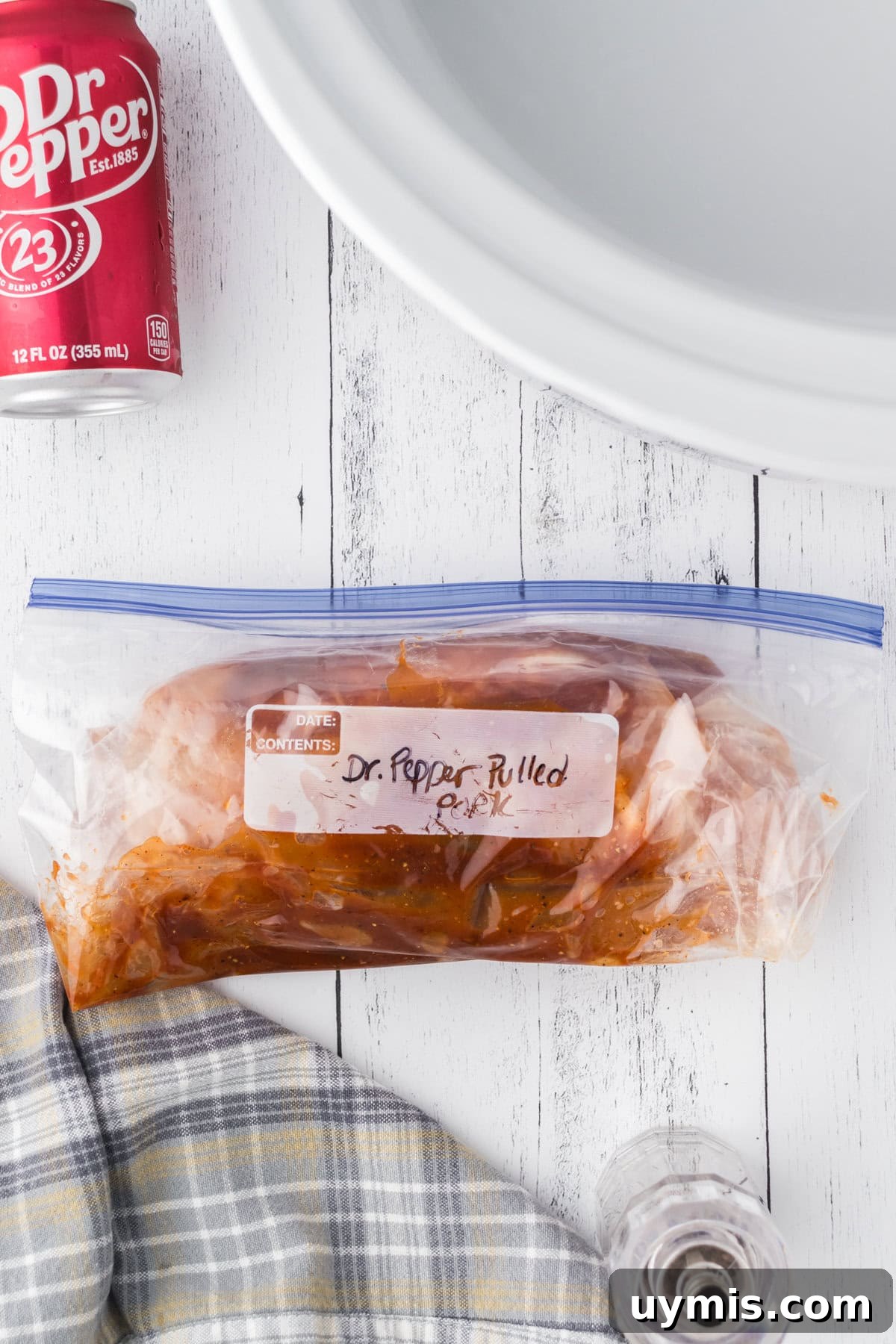 Slow-Cooker Dr Pepper Pulled Pork Recipe 8 Dr Pepper pulled pork in a freezer bag labeled for storage.