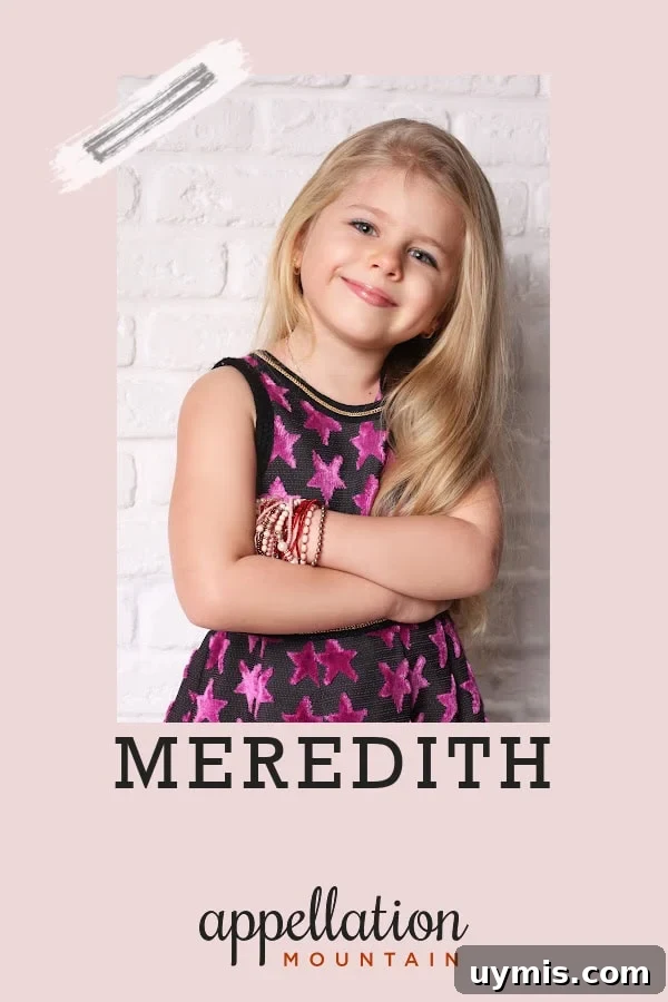 Meredith Baby Name Meaning, Origin and Popularity 2 girl child with long blonde hair wearing dark purple dress with purple stars; baby name Meredith