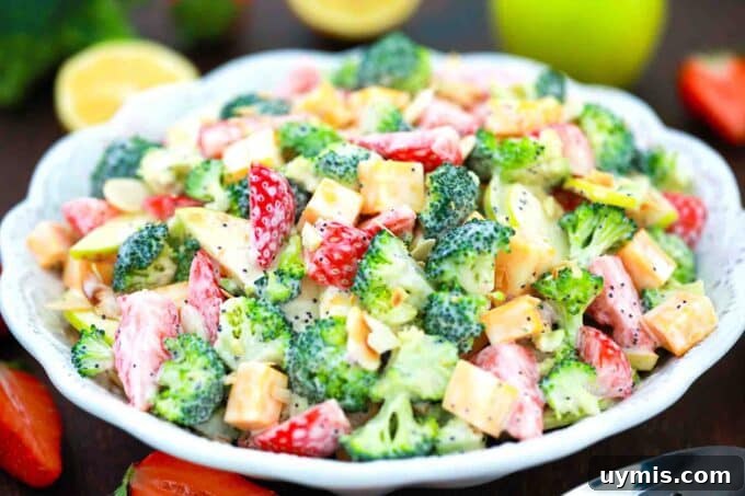 a bowl of broccoli strawberry salad