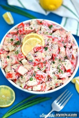Crab salad topped with lemon slices.