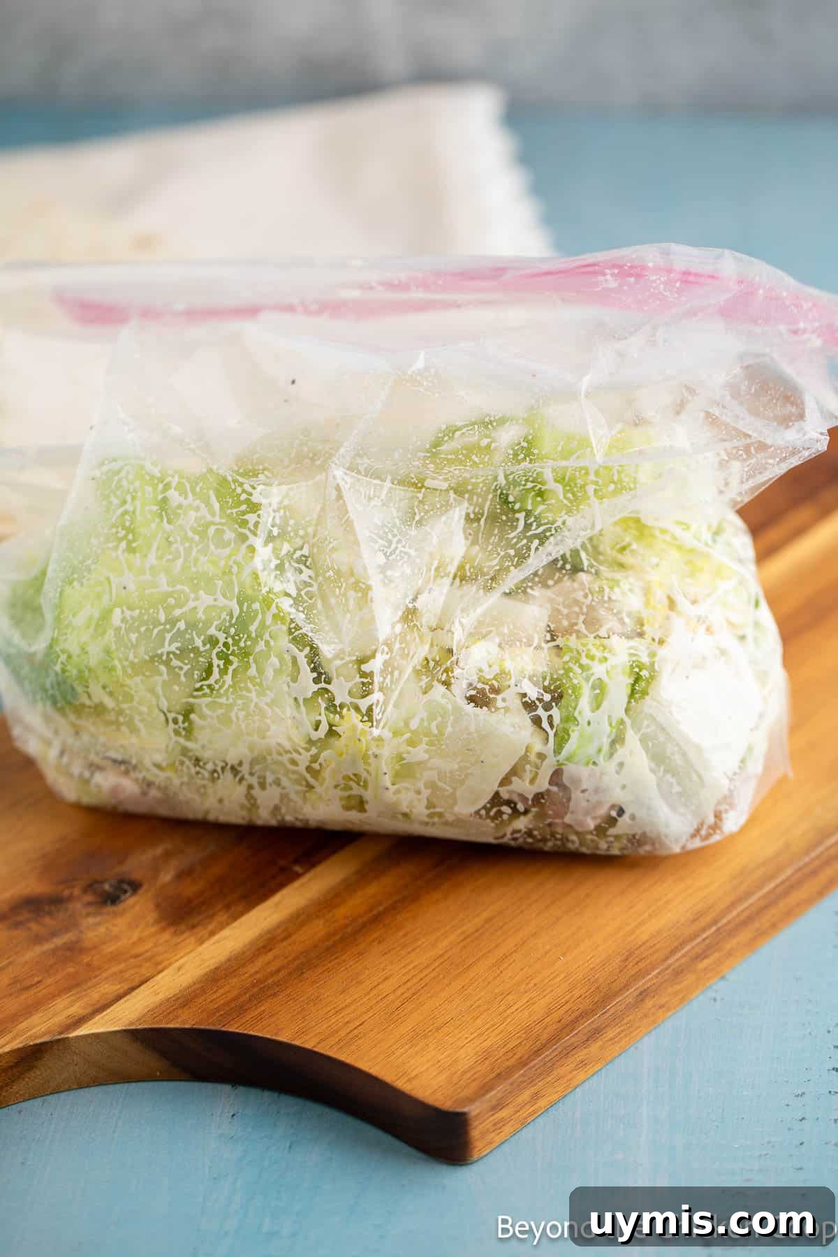 Chicken Caesar Wrap with Creamy Dressing 4 Mixed chicken Caesar in a plastic bag.