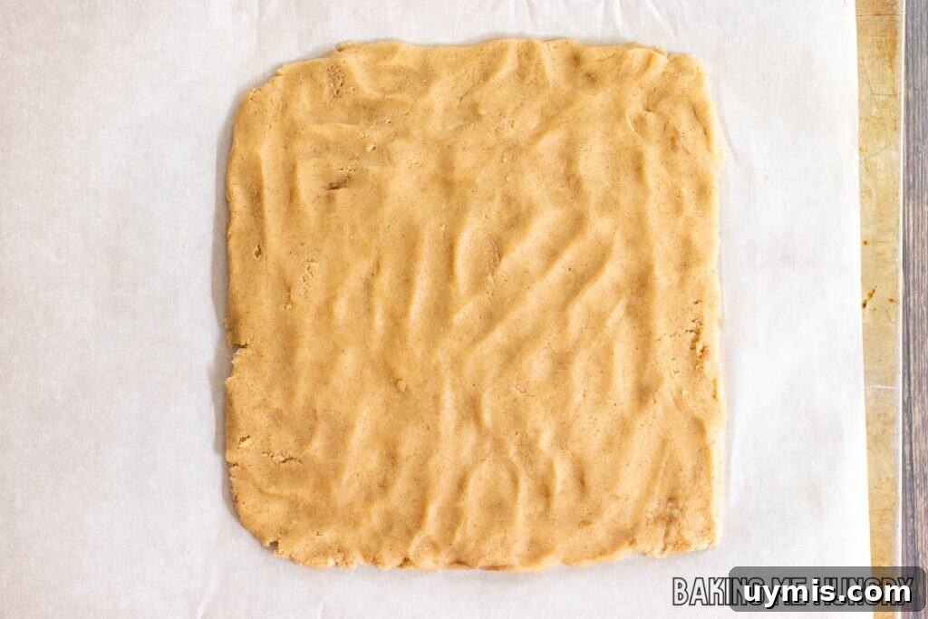 Cinnamon Shortbread Cookies Recipe 6 dough pressed into a square on parchment