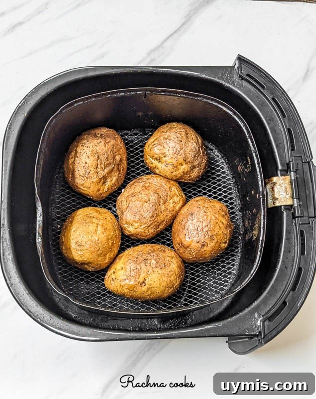Crispy Air Fryer Baked Potatoes 4 Air fried potatoes with crispy skins.