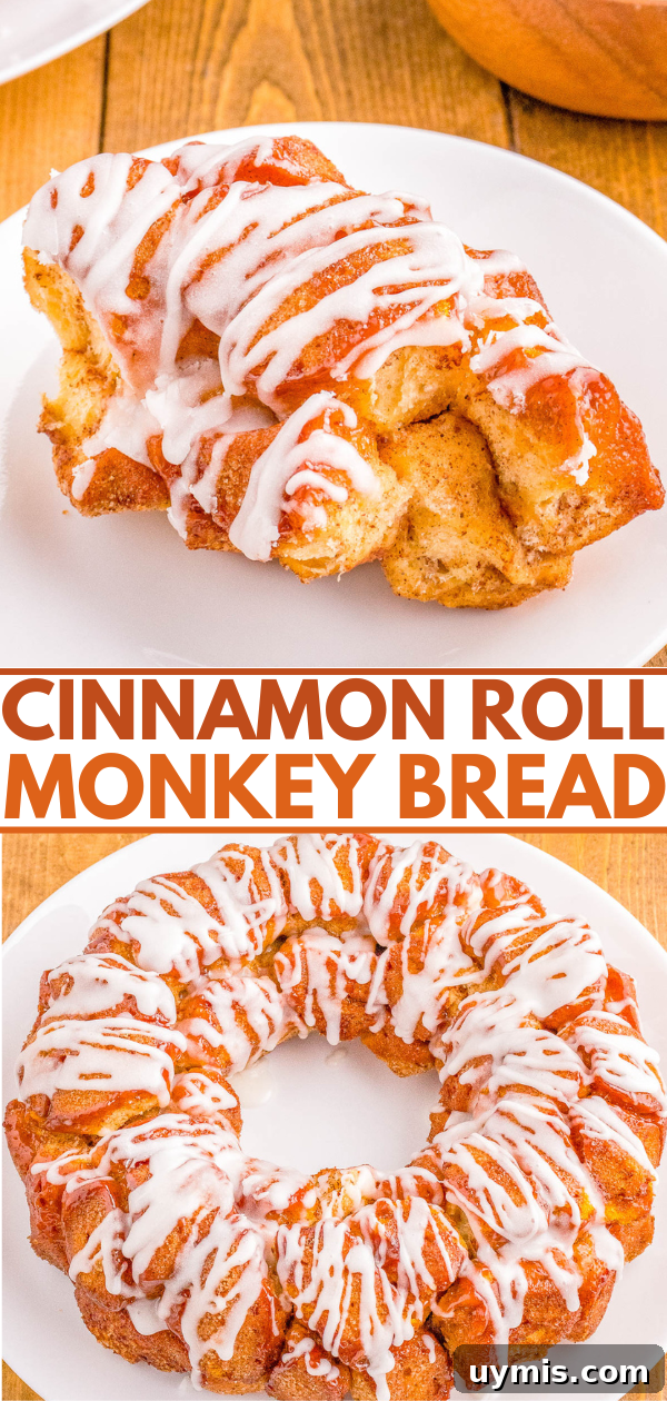 Pull-Apart Cinnamon Roll Monkey Bread Recipe 9 A cinnamon roll monkey bread in a ring shape, drizzled with white icing, displayed on a wooden table.