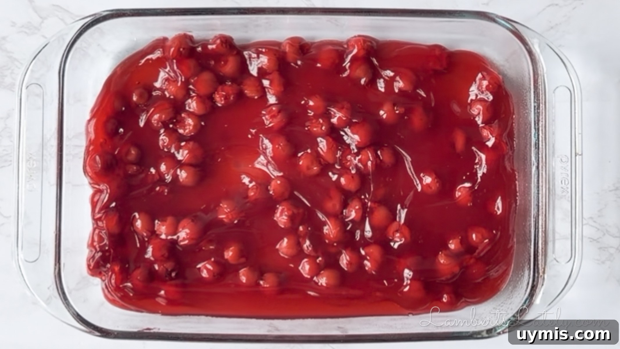 Chocolate Cherry Dump Cake Recipe 6 cherry pie filling in a pyrex baking dish.