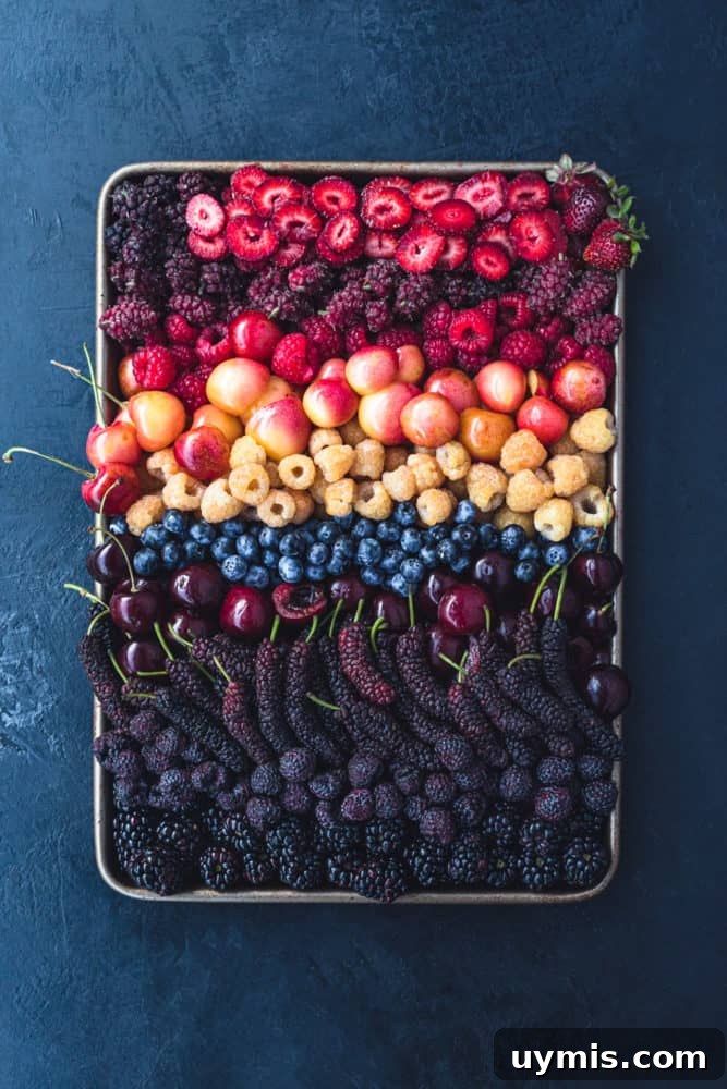 Summer Berry Galette with Fresh Seasonal Berries 11 Sheet pan filled with colorful mixed berries.