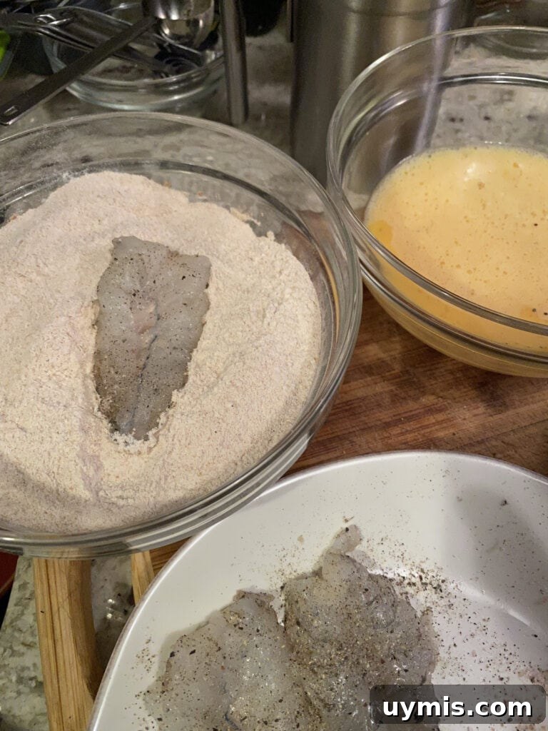 Italian Pan Fried Butterflied Shrimp Recipe 11 Coating the shrimp in flour.