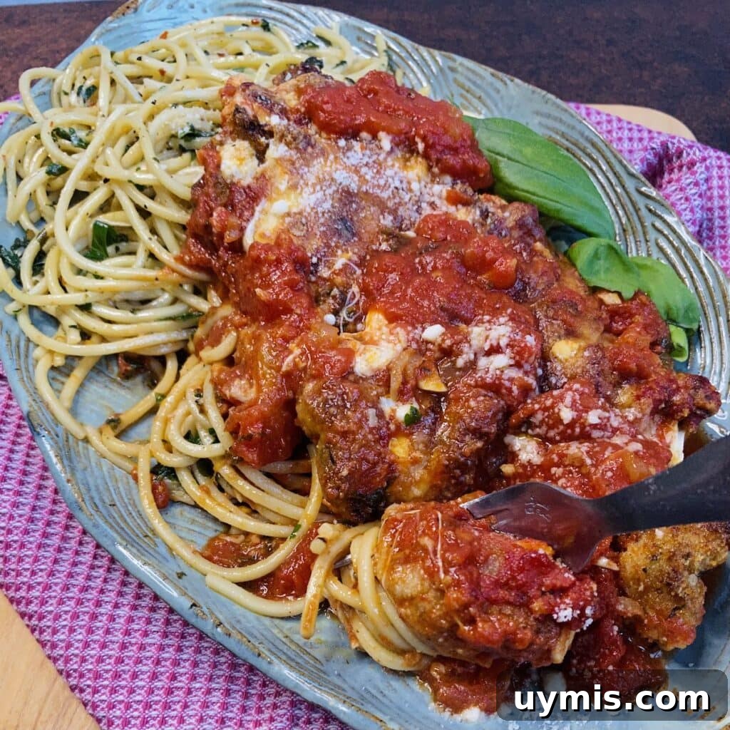 Italian Pan Fried Butterflied Shrimp Recipe 18 Italian Fried Shrimp turned into a saucy and cheesy shrimp parm and served with spaghetti with garlic and olive oil.