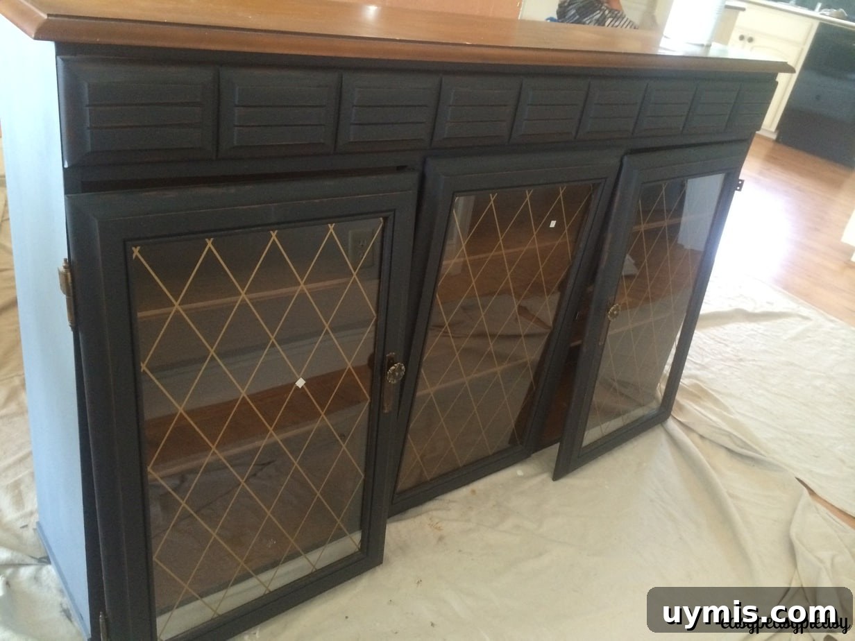 Top of a China Hutch before DIY makeover