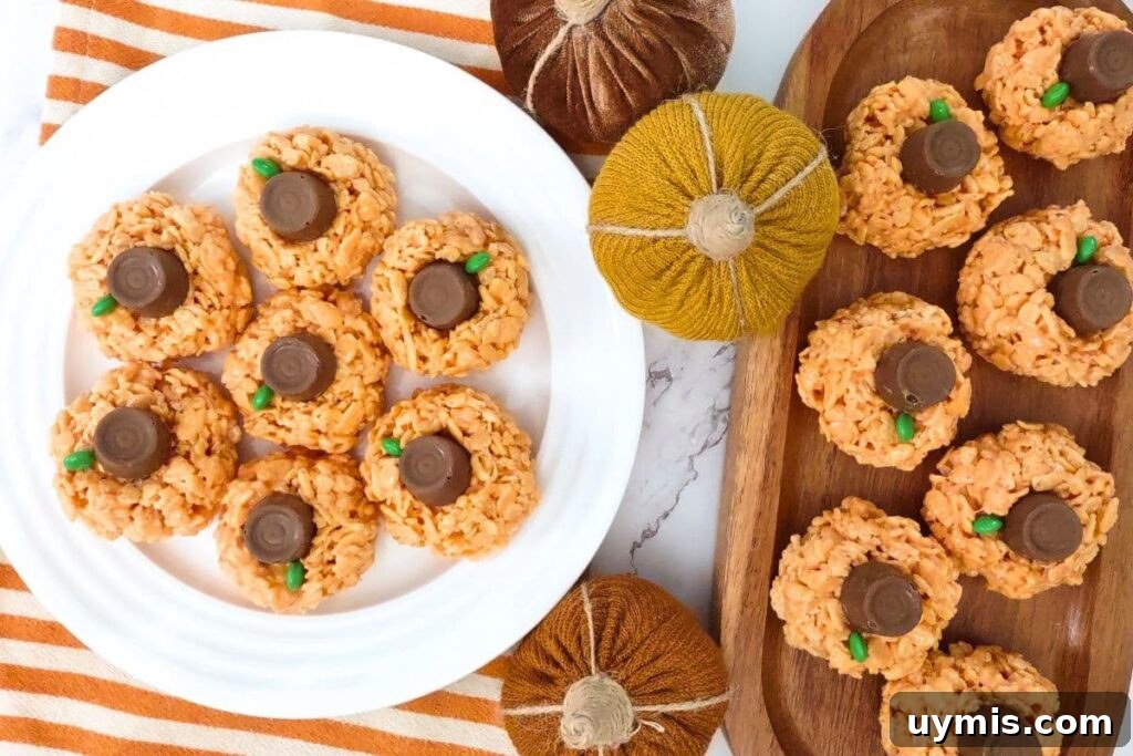 Fall Pumpkin Rice Krispie Treats with Rolos 11 overhead view of halloween pumpkin rice krispie treats stacked on a plate