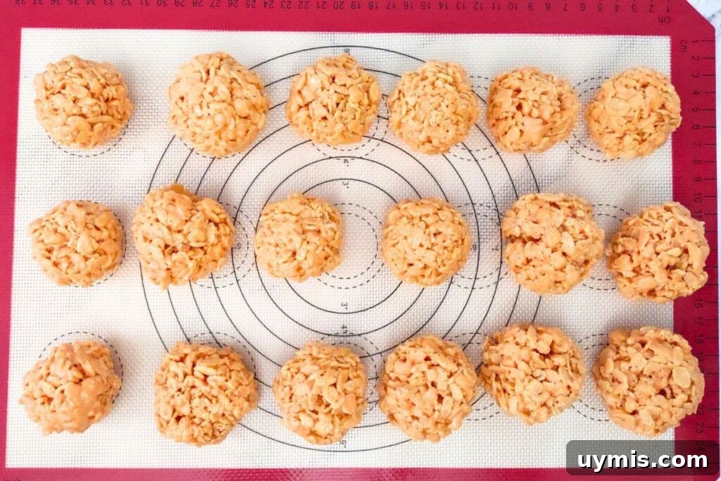 Fall Pumpkin Rice Krispie Treats with Rolos 9 form krispie treats into even balls