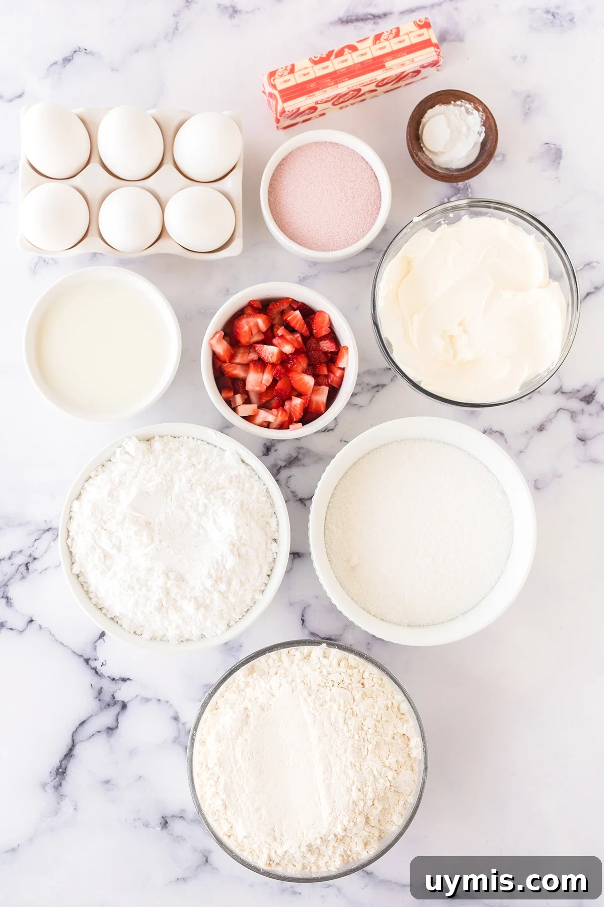 Moist Strawberry Sheet Cake with Cream Cheese Frosting 3 Ingredients to make strawberry sheet cake set out on counter.