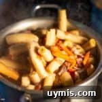 Ndizi Nyama: Green Plantain and Beef Stew 4 a pot full of beef and banana stew