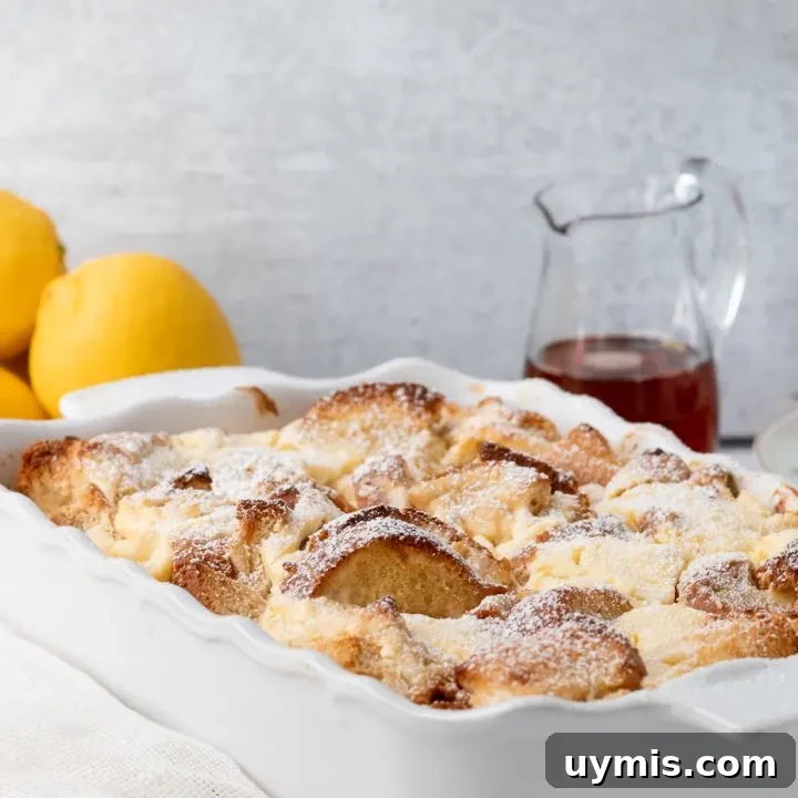 lemon cheesecake french toast casserole dusted with powdered sugar