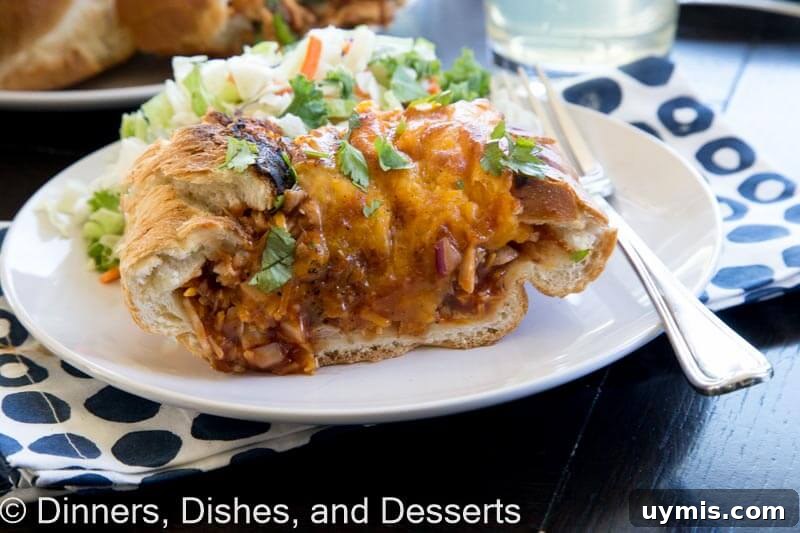 BBQ Chicken Stuffed French Bread Recipe 3 barbecue chicken stuffed french bread on a plate