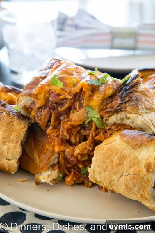 BBQ Chicken Stuffed French Bread Recipe 4 barbecue chicken stuffed french bread on a plate