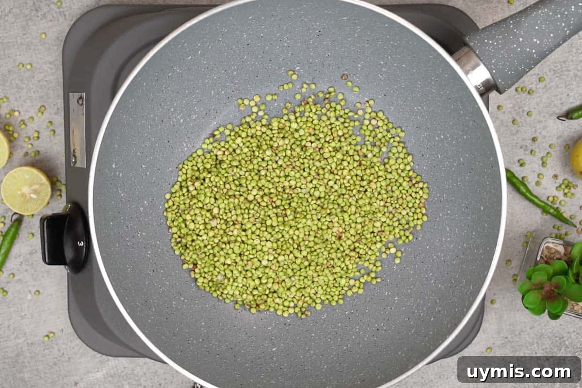 Ponk Bhel (Hurda) Recipe: Gujarati Tender Sorghum Snack 3 Roasting hurda in a pan.