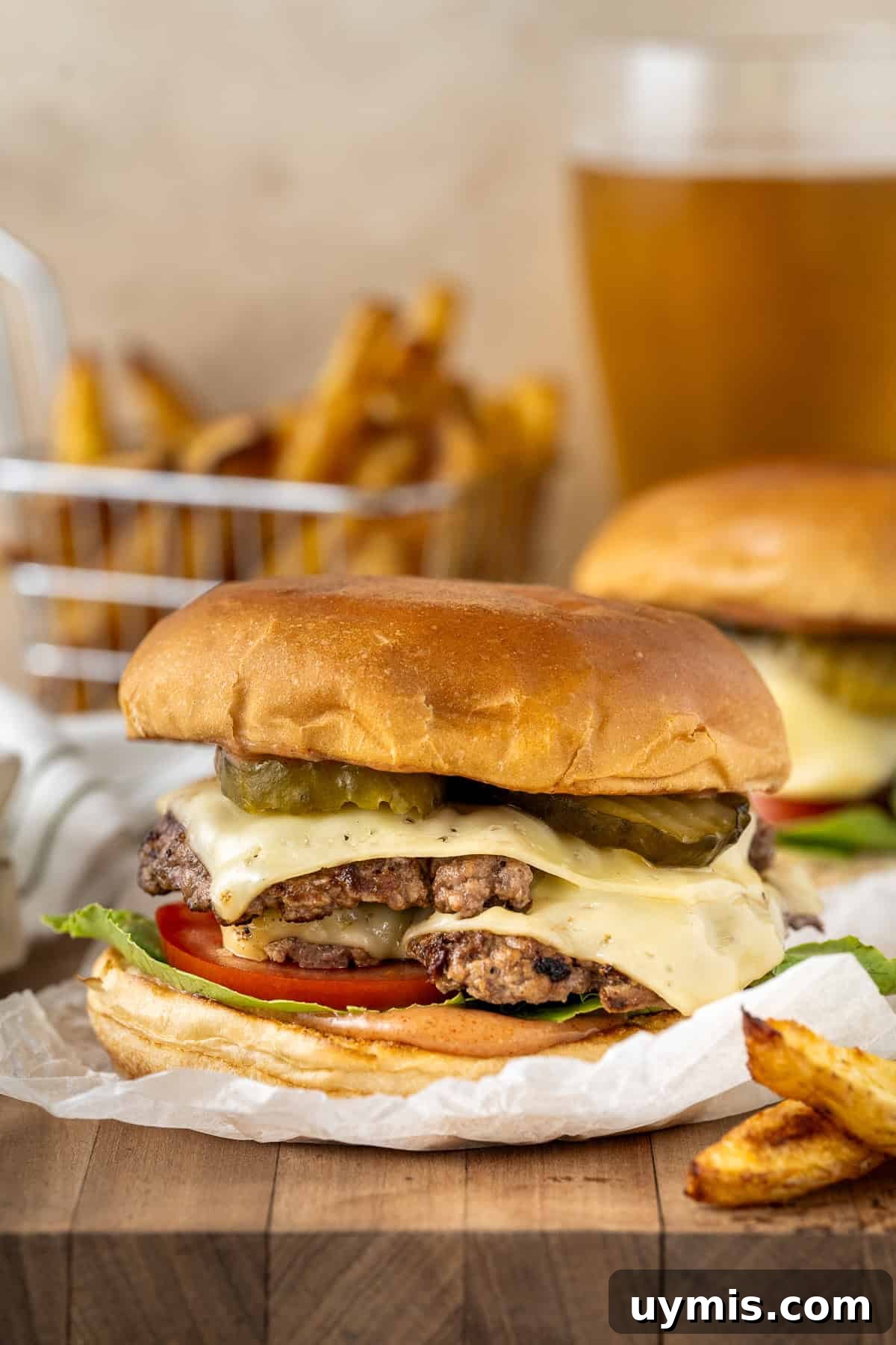 Smash Burger Recipe with Crispy Edges 2 Smash burger with oven baked chips.