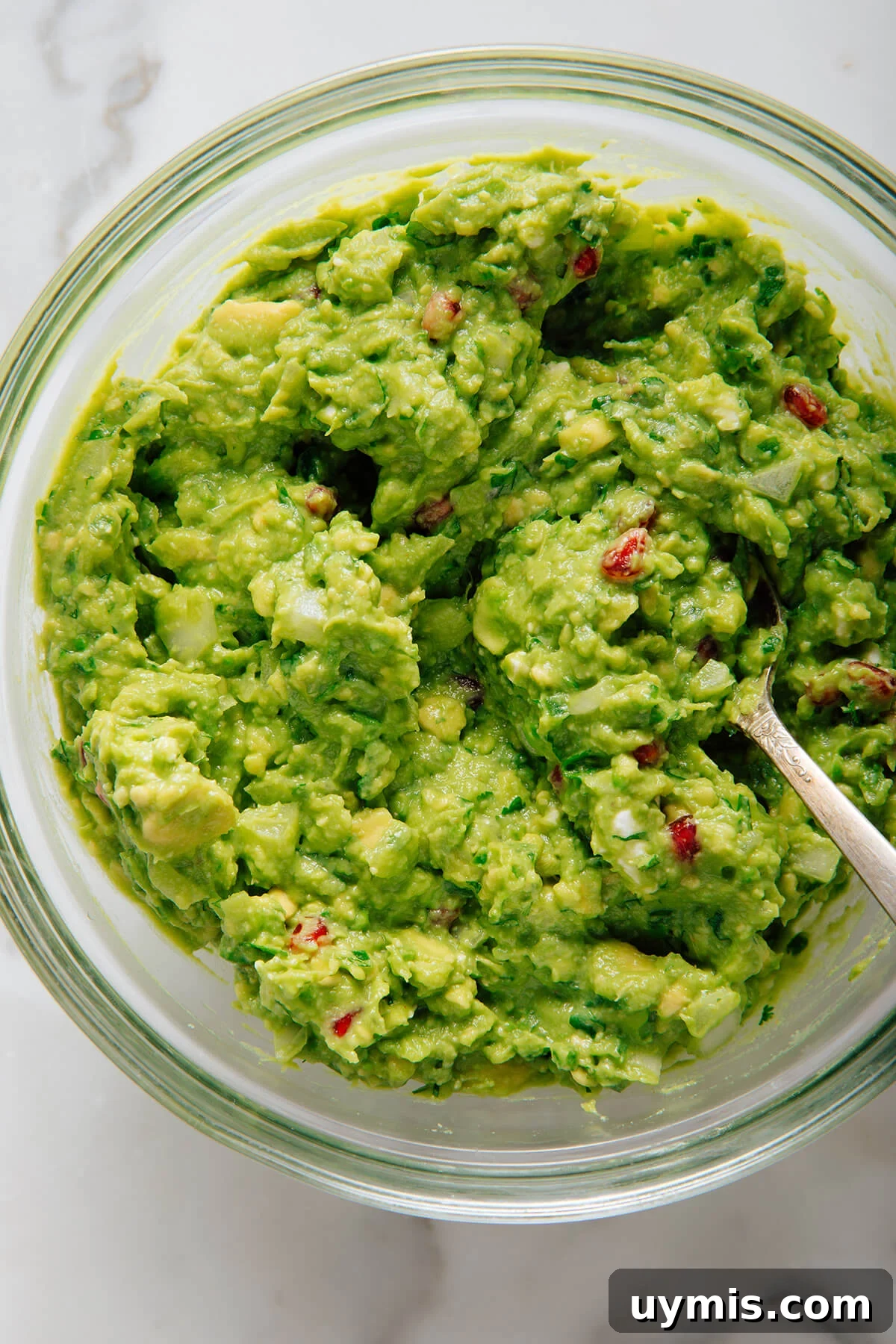 Holiday Pomegranate Guacamole Recipe 6 pomegranate guacamole in bowl
