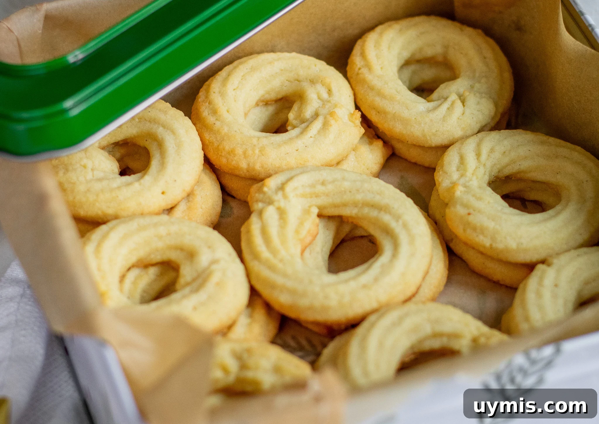 Vanilla butter cookies in a cookie tin.