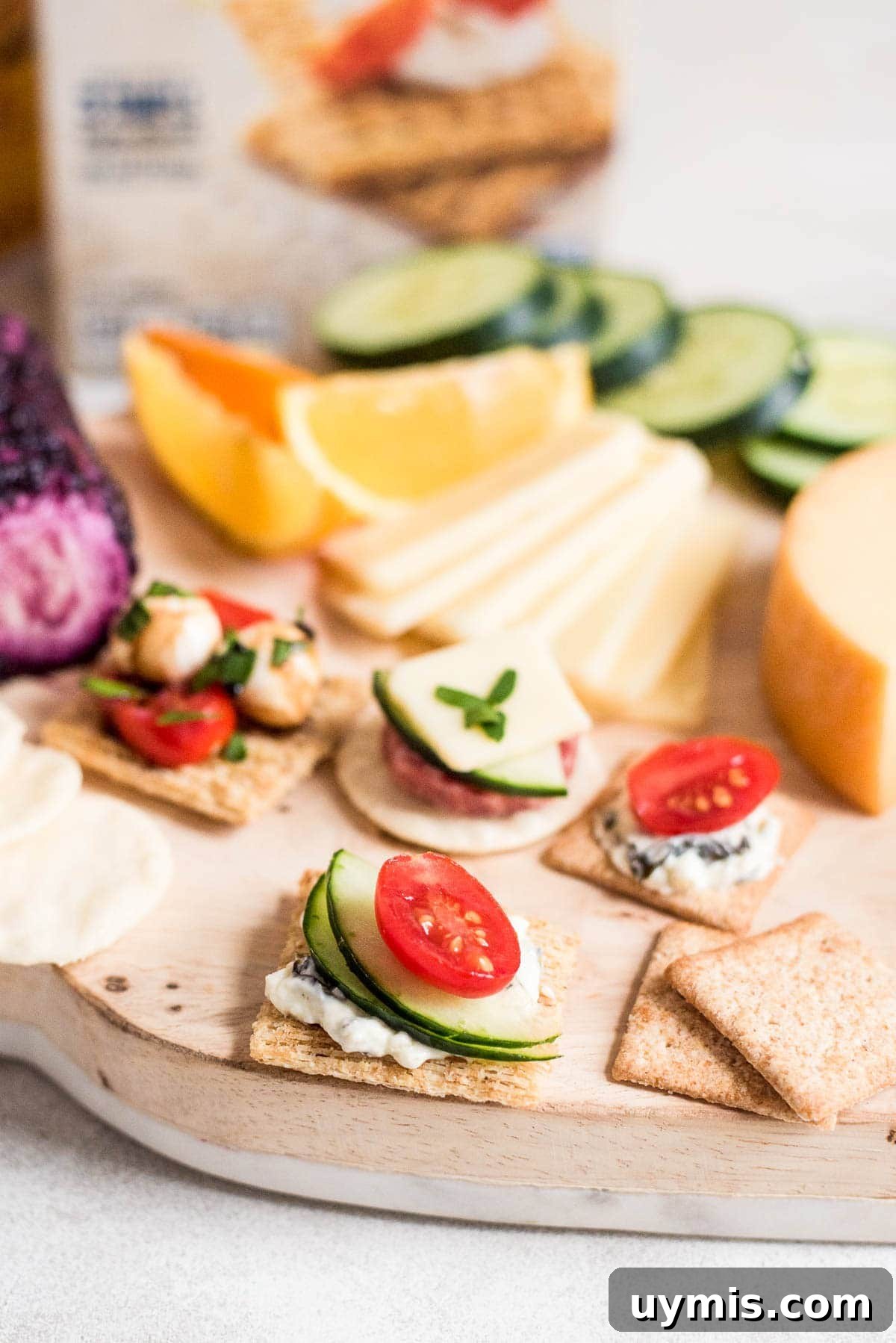 fruit and crackers on girls night cheeseboard