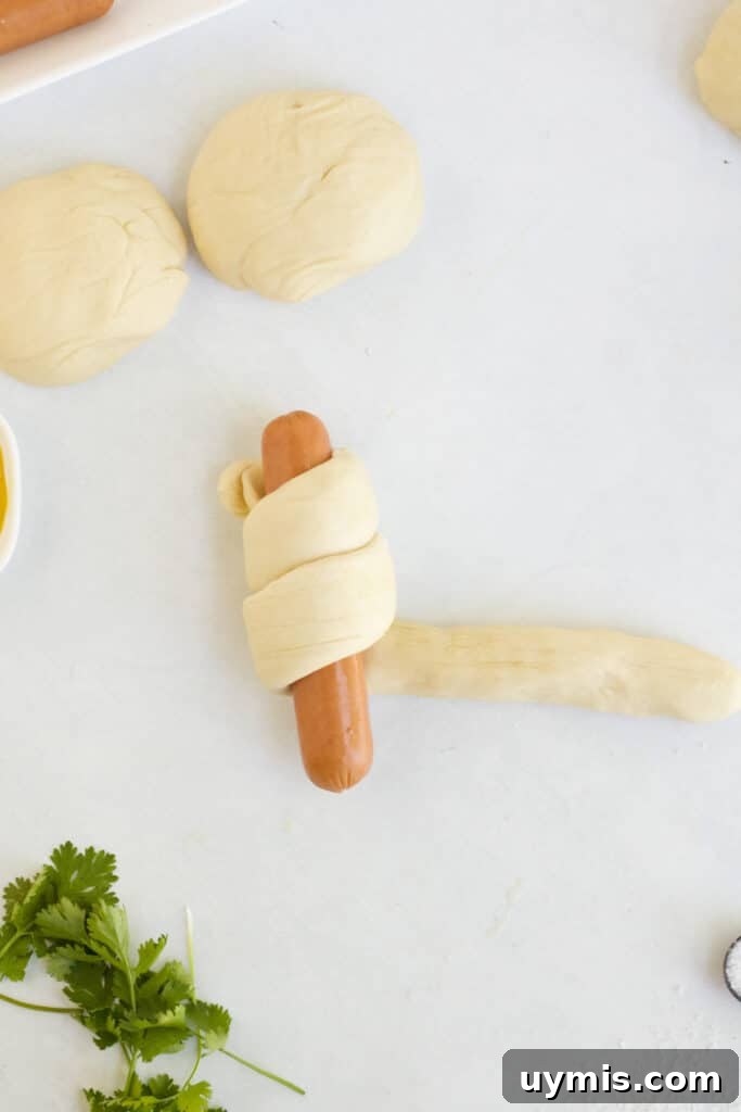 Pretzel Dogs Recipe: Soft Pretzel-Wrapped Hot Dogs 5 Pretzel dog dough ropes