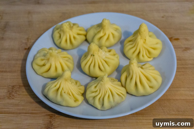 Raw khinkali ready to be boiled