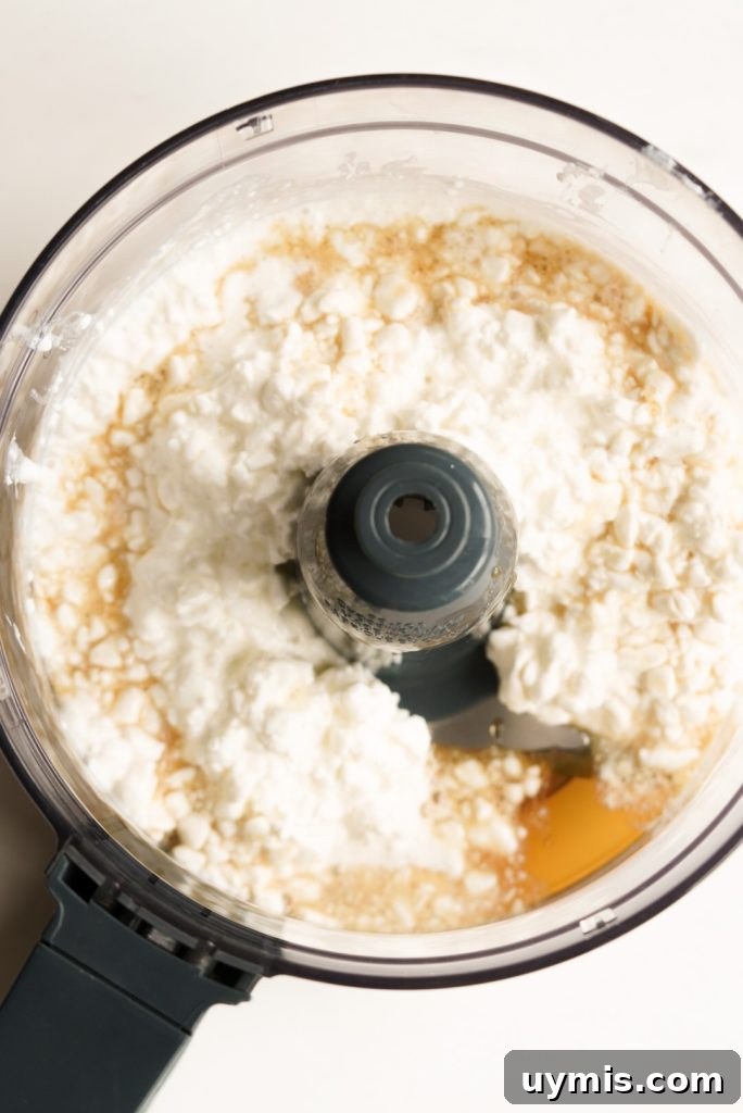 Viral High Protein Frozen Cottage Cheese Bark 5 cottage cheese and maple syrup in a food processor