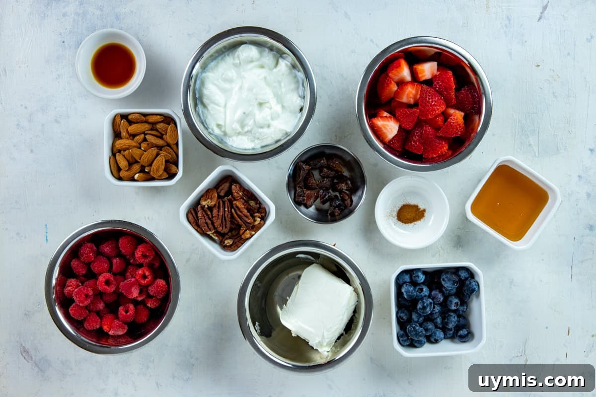 Layered Mixed Berry Parfaits with Greek Yogurt and Granola 3 All ingredients measured out in individual containers.