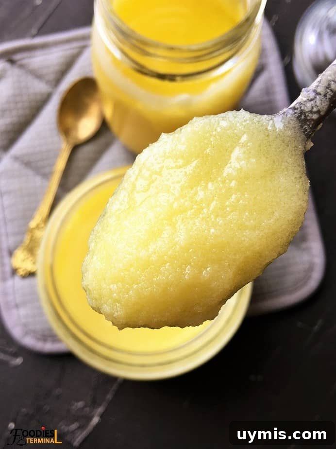 Instant Pot Ghee Recipe: Homemade Clarified Butter 12 homemade traditional grainy ghee in two jars and a spoon