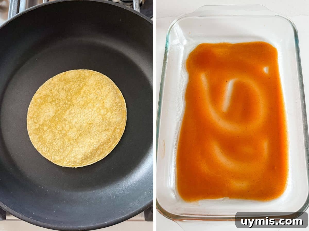 A corn tortilla heating in a fry pan and a thin layer of enchilada sauce on the bottom of the pan.