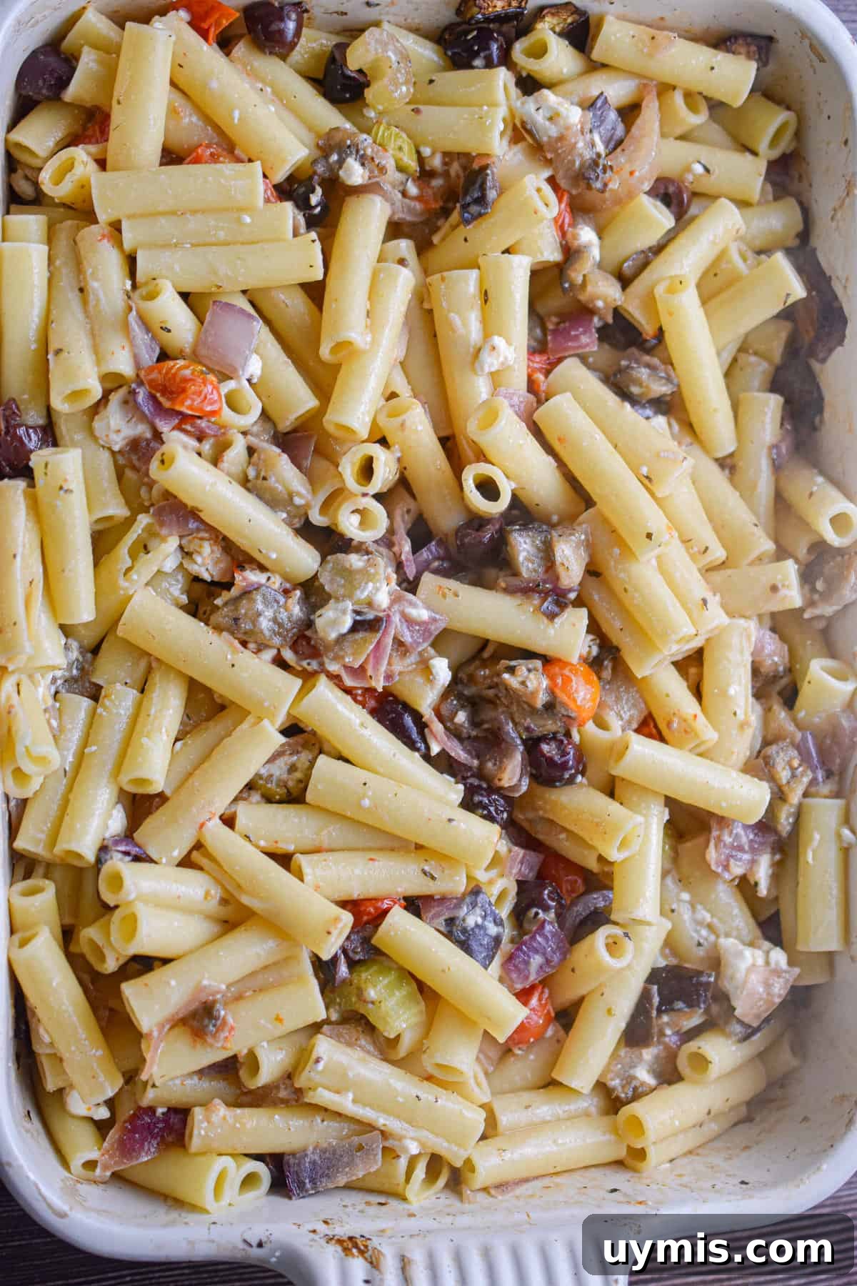 Creamy Greek Baked Pasta with Feta 9 The pasta is mixed into the baking dish.