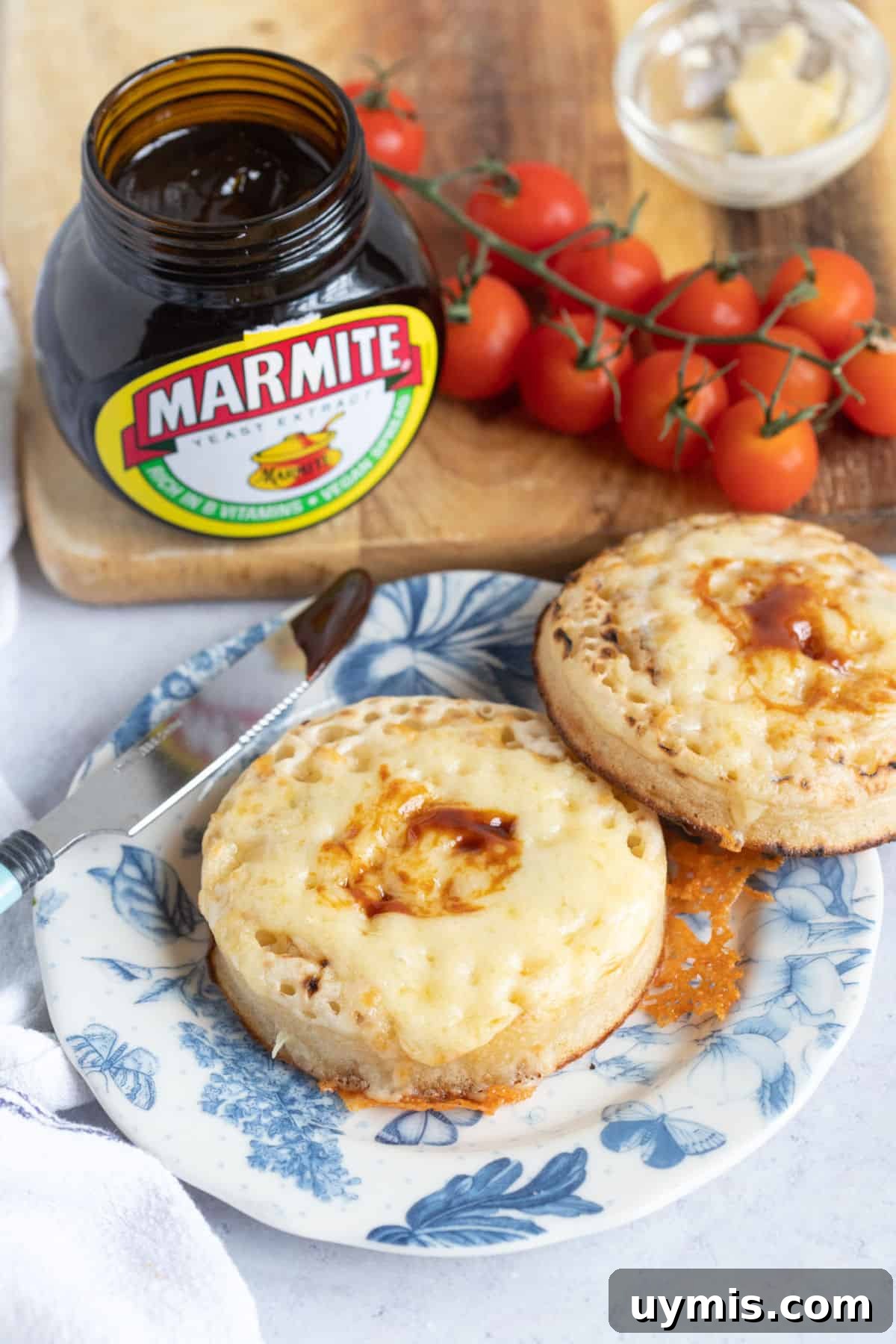 Air crumpets with melted cheese and marmite.