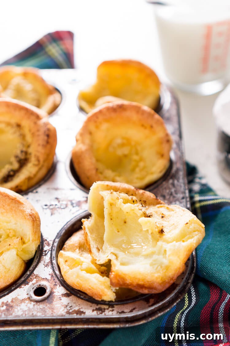 Classic Yorkshire Pudding Recipe 5 Yorkshire Pudding Popovers baked in a muffin pan with butter or drippings