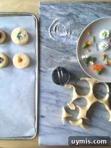 Lemon Cream Scones Recipe with Edible Flowers 5 Scones cooling on a rack