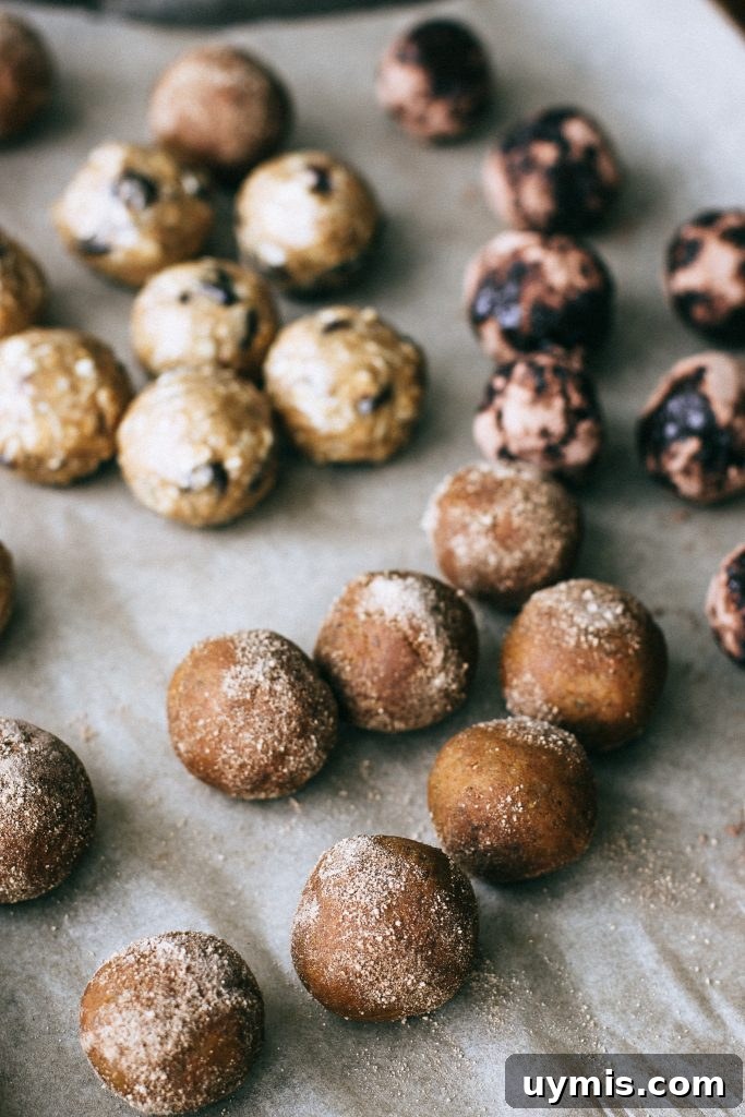 Bliss Balls Recipe 3 Ways 2 raw energy balls on a tray
