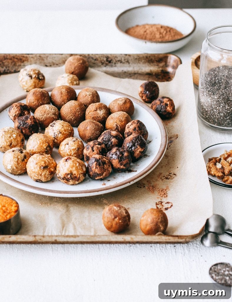Bliss Balls Recipe 3 Ways 5 raw energy balls on a plate on a baking tray