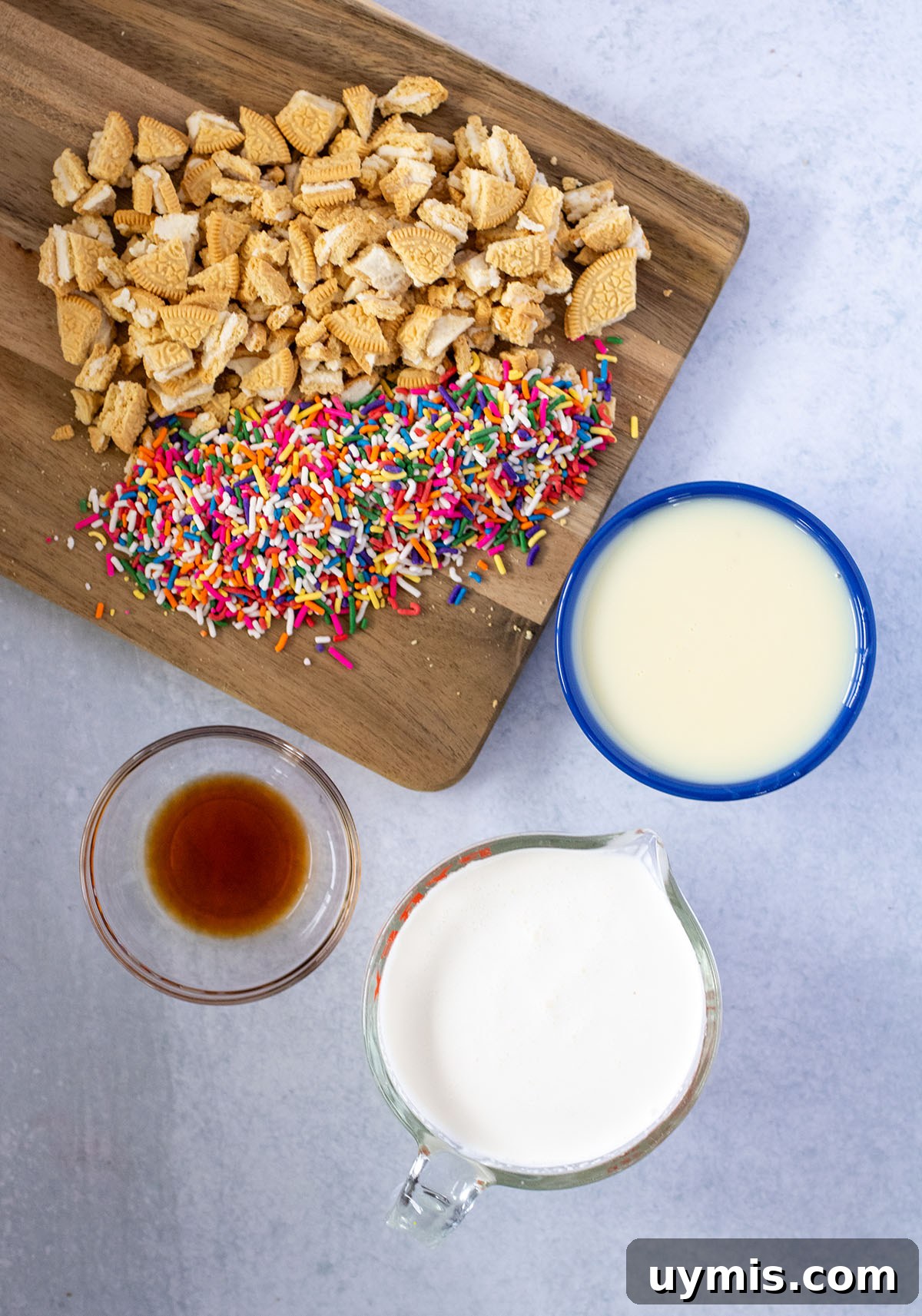 No-Churn Funfetti Golden Oreo Ice Cream Recipe 3 Ingredients to make Golden Oreo Ice Cream set out on the counter.