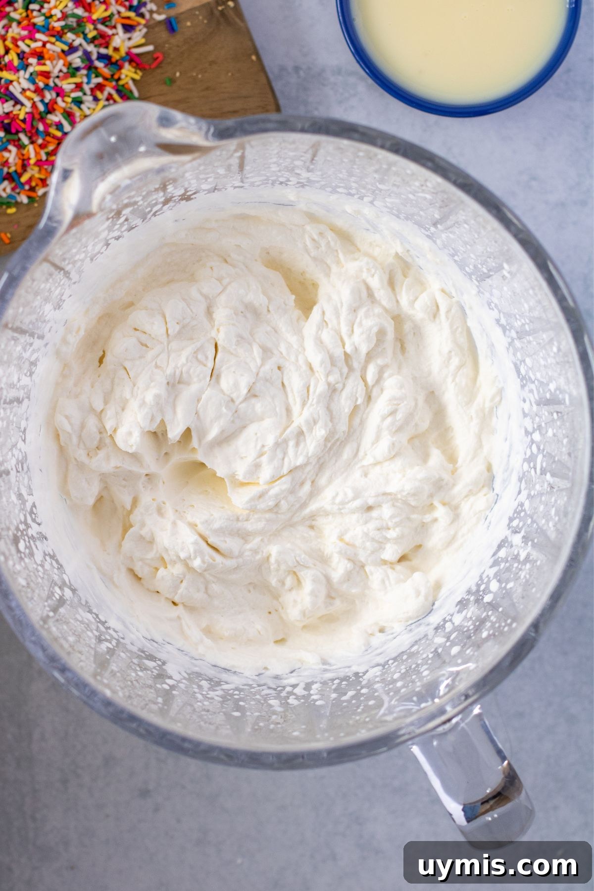 No-Churn Funfetti Golden Oreo Ice Cream Recipe 4 Heavy cream and vanilla beat together in a mixing bowl into stiff peaks.
