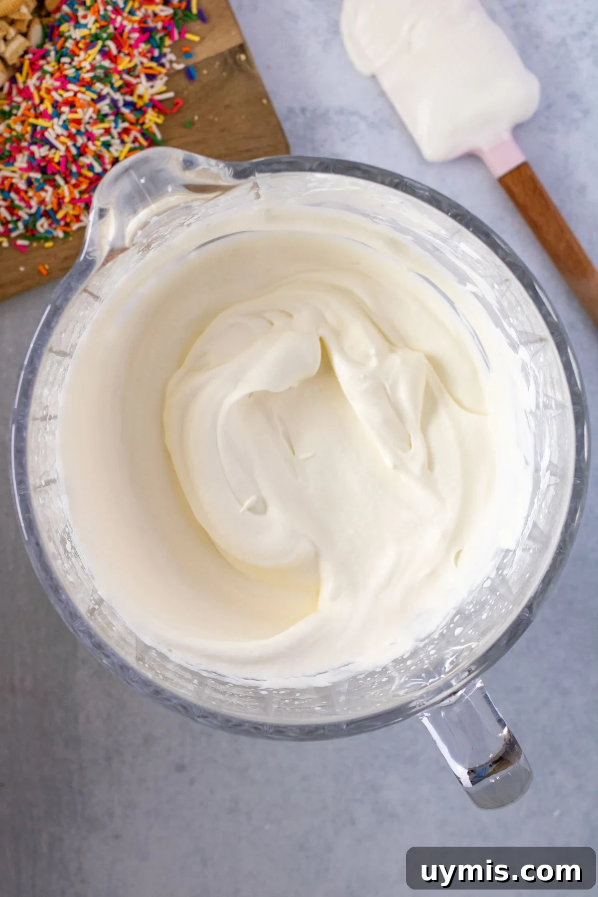 No-Churn Funfetti Golden Oreo Ice Cream Recipe 6 Golden Oreo vanilla ice cream base in mixing bowl.