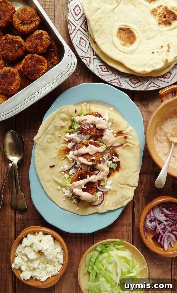 Red Lentil Koftas with Flatbread and Harissa Yogurt Sauce 3 Vegetarian red lentil and bulgur wheat koftas with flatbreads and harissa yoghurt