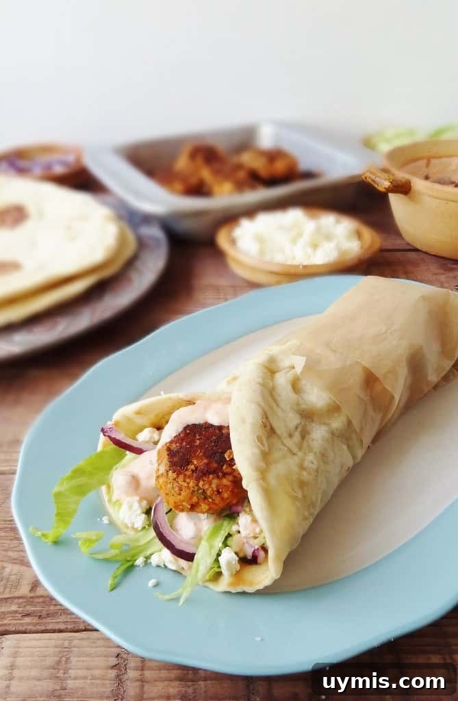 Red Lentil Koftas with Flatbread and Harissa Yogurt Sauce 6 Vegetarian red lentil koftas with flatbreads and harissa yoghurt