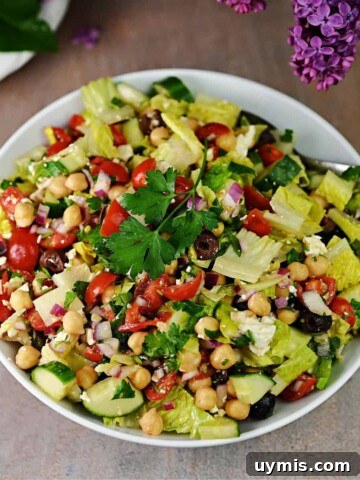 Serving bowl filled with Mediterranean chopped salad.