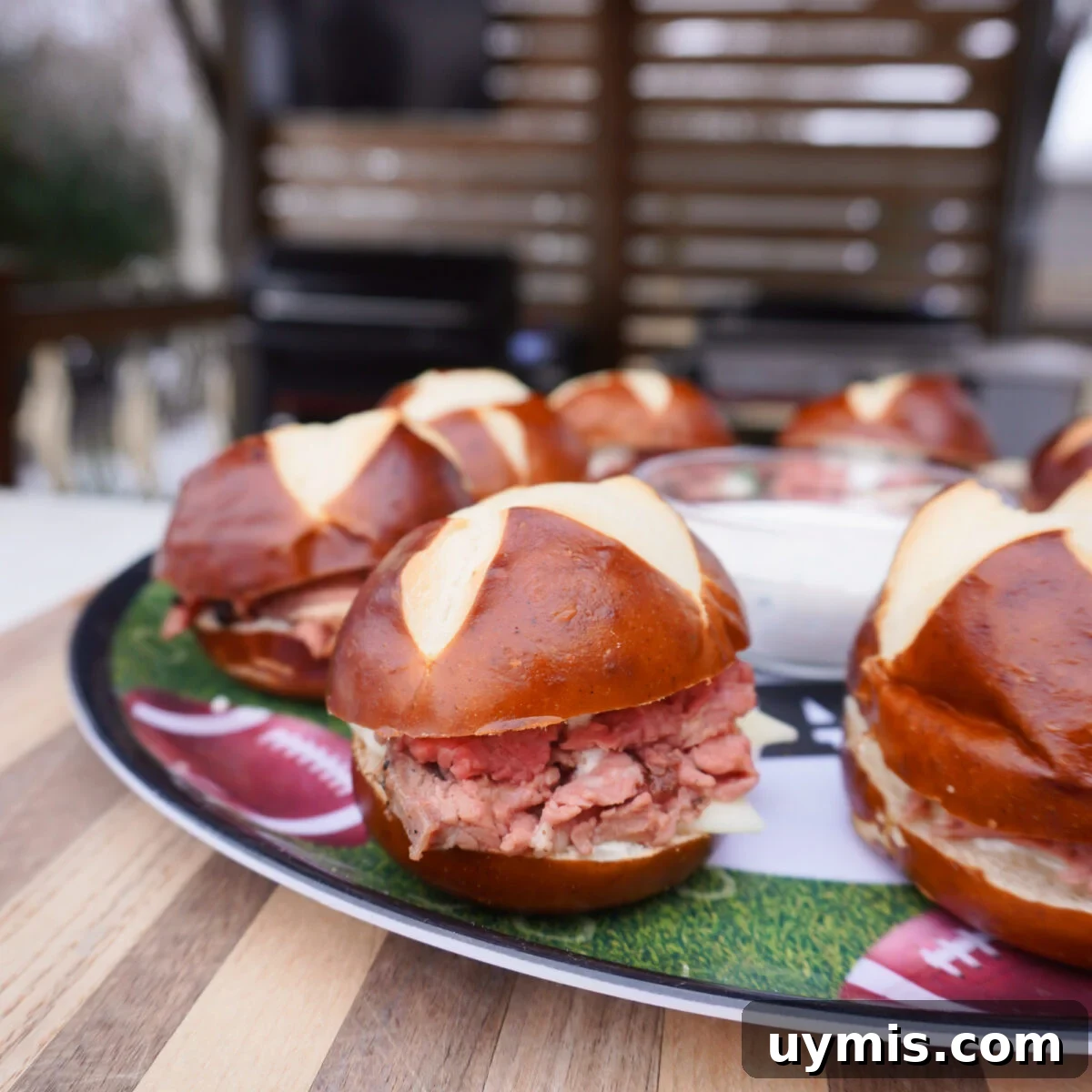 Grilled Prime Rib Sliders with Horseradish Sauce 9 Grilled Prime Rib Sliders on a platter.