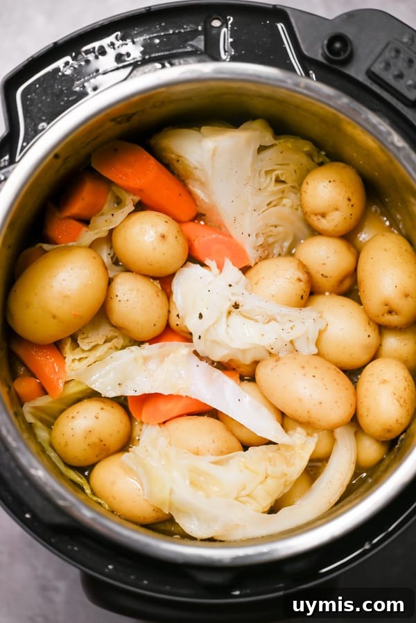 How to Make Tender Instant Pot Corned Beef 5 Cabbage, potatoes and carrots in an Instant Pot.