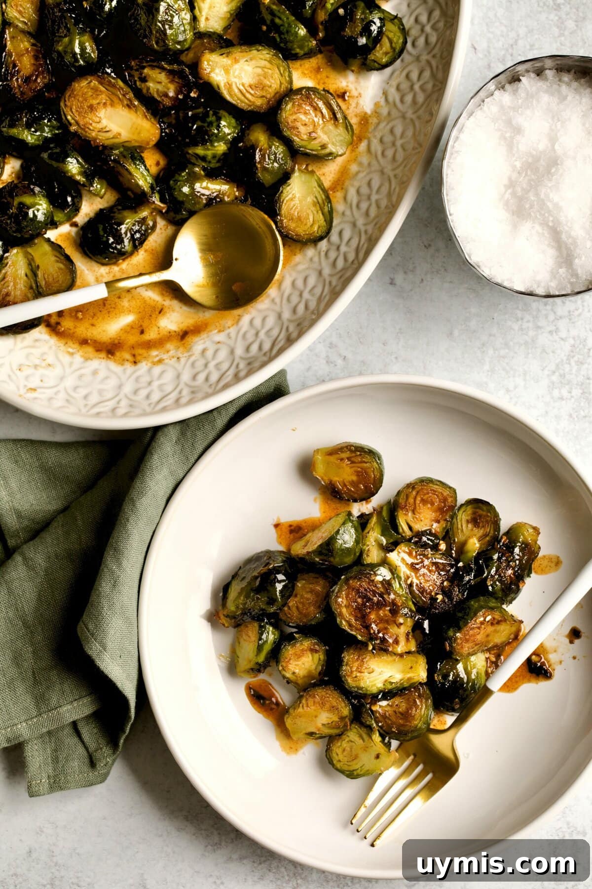 LongHorn Steakhouse Copycat Crispy Brussels Sprouts Recipe 12 Copycat Longhorn steakhouse crispy brussels sprouts on a plate and in a serving bowl.