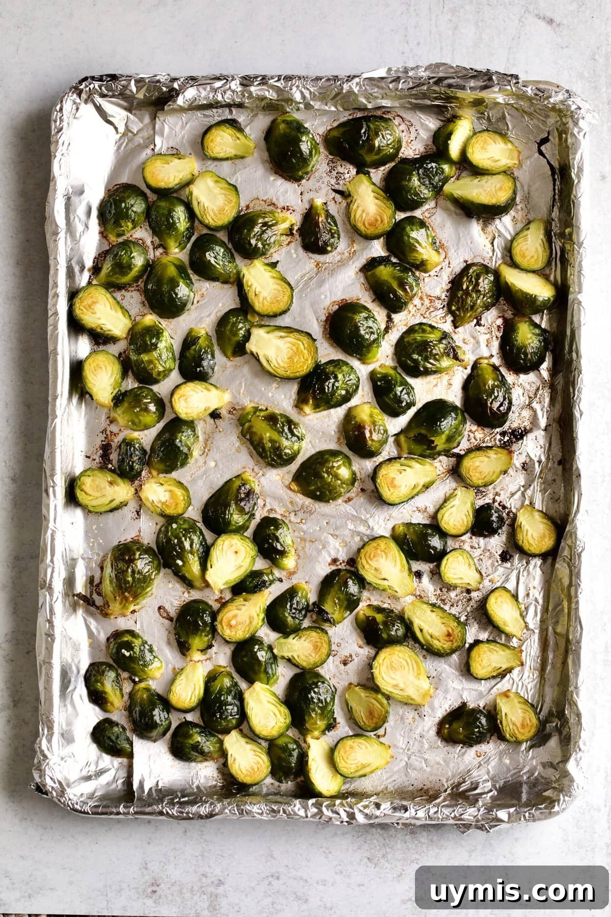 LongHorn Steakhouse Copycat Crispy Brussels Sprouts Recipe 8 roasting the Brussels Sprouts on a pan.