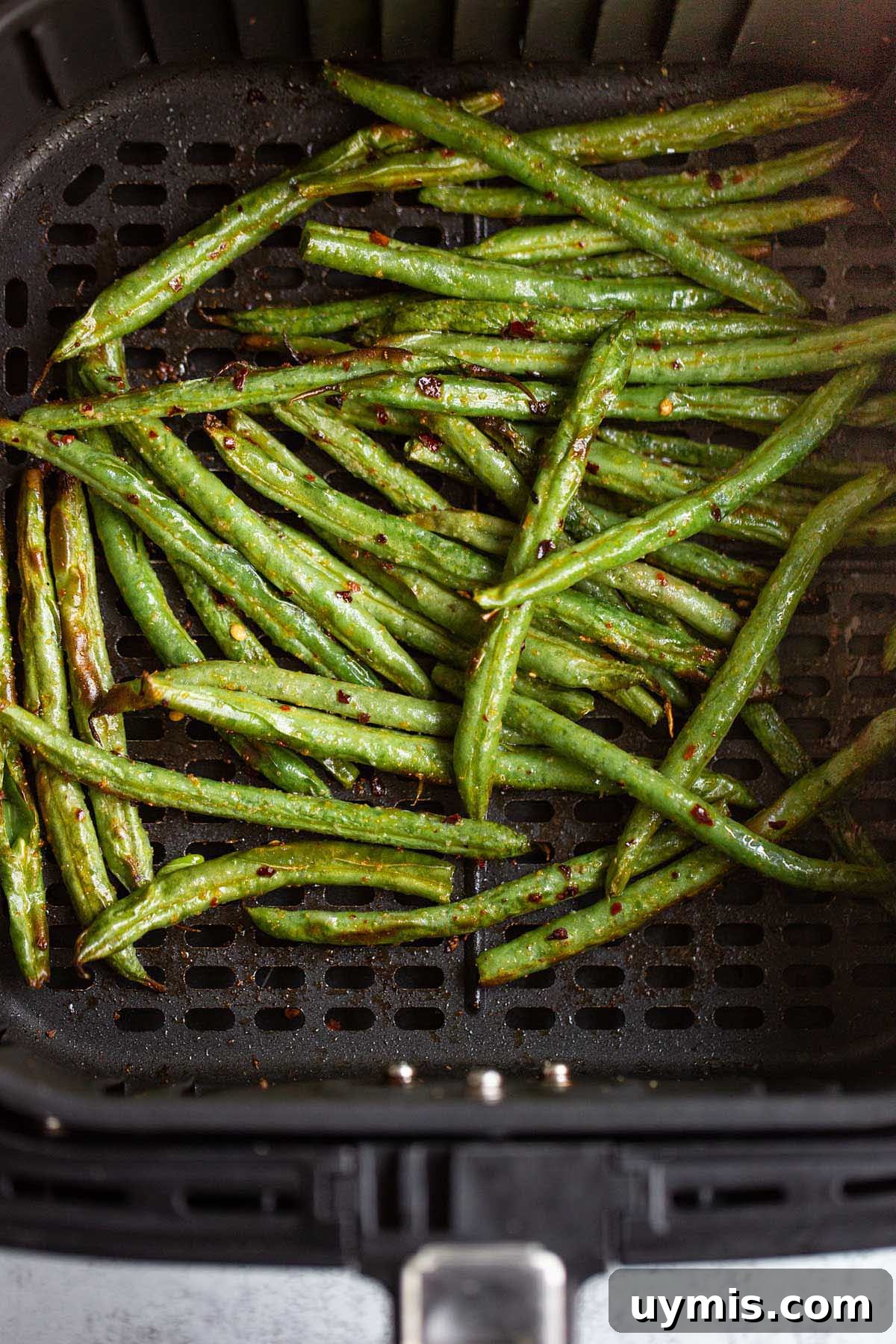 Crispy Spicy Air Fryer Green Beans 7 Spicy green beans in air fryer basket