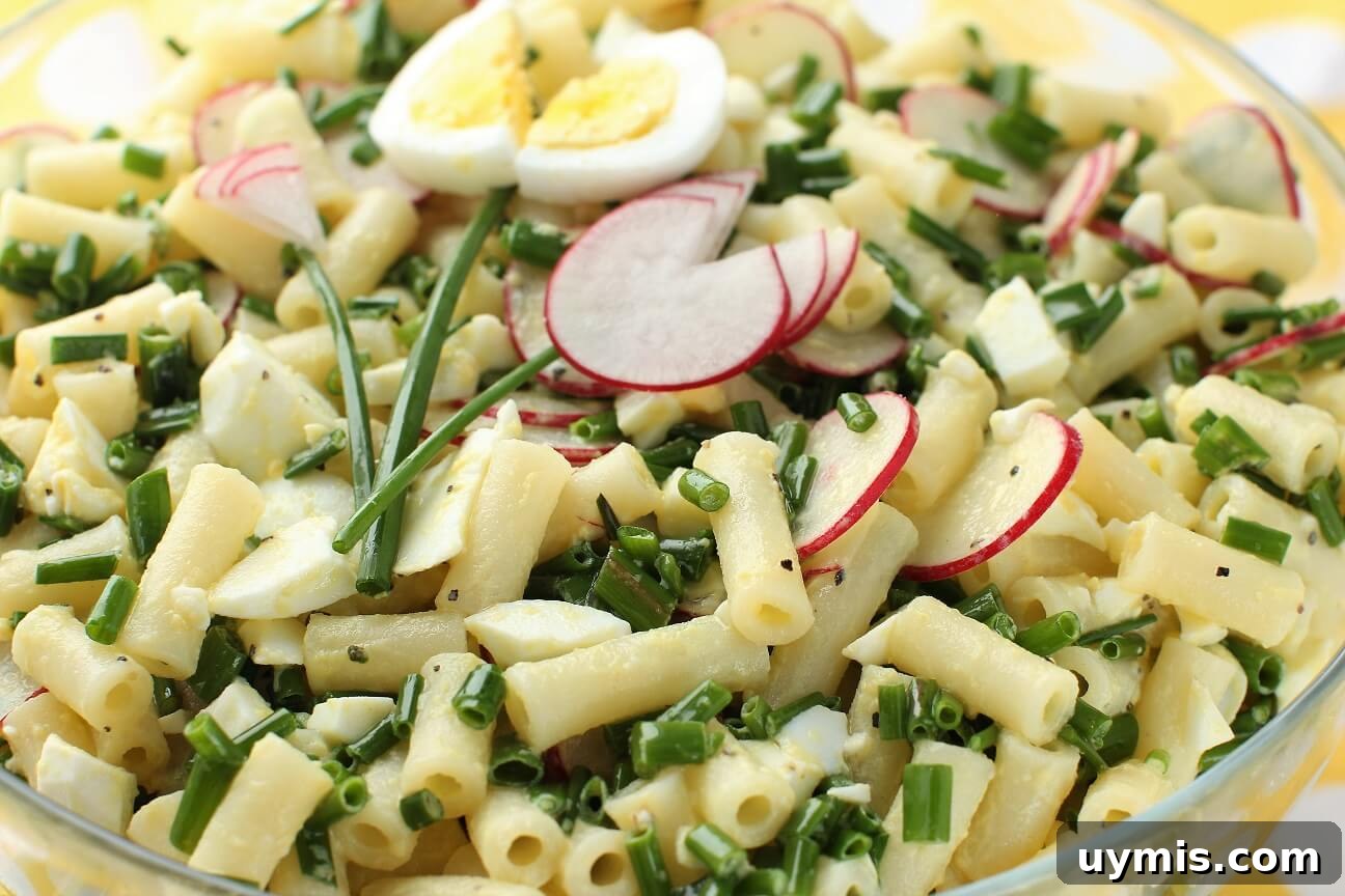 Spring Chive and Egg Pasta Salad Recipe 13 The chive & egg pasta salad is garnished and ready to serve